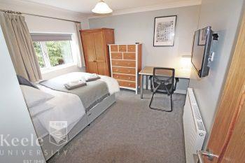 Bedroom 1 - A very large double bedroom with a double divan bed, wall mounted LED Tv, bedroom furniture (wardrobes / drawers/dresser / desk + study chair)