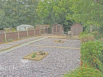 Large Private Garden with ample shed storage and outdoor eating / socialising area.